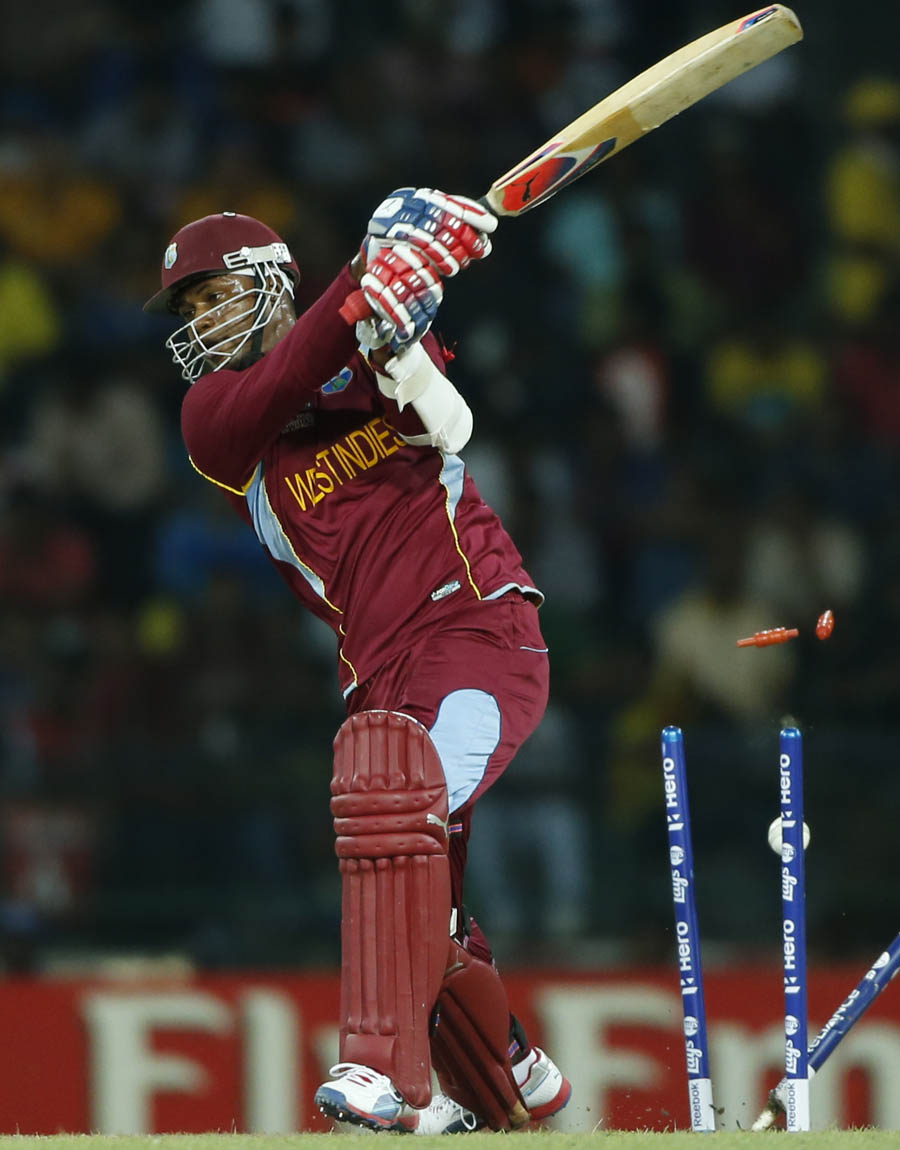 Marlon-Samuels-is-bowled-off-a-slower-delivery-by-Pat-Cummins-Australia-v-West-Indies-2nd-semi-final.jpg