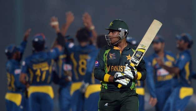 Pakistani-cricketer-Sharjeel-Khan-reacts-after-being-given-out-as-Sri-Lankan-cricketers-celebrate-his-wicket-during-the-opening-match-of-the-Asia-Cup.jpg