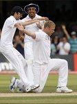 england_s_andrew_flintoff_on_his_knees_is_congratu_783701464a.jpg