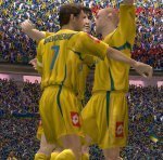 Shevchenko and his teamates celebrate the opener it their crucial win over Switzerland.JPG
