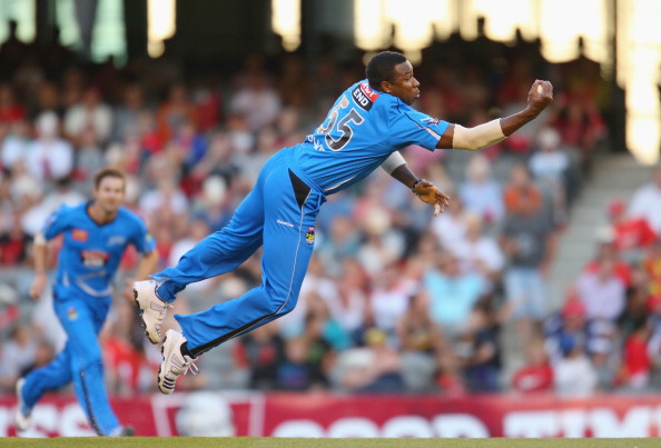 kieron-pollard-of-the-strikers-takes-a-catch-off-his-own-bowling-to-picture-id158866317
