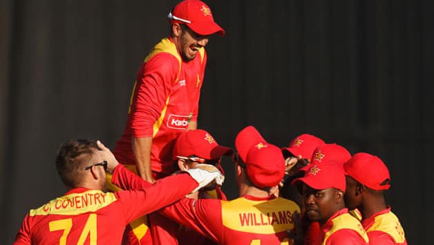 Zimbabwe-players-celebrate-a-wicket.jpg