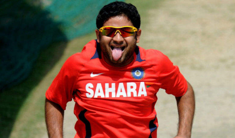 piyush_chawla_in_red_t-shirt.jpg